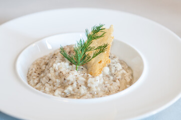 Truffle Risotto with Parmesan Crisp and Fresh Dill