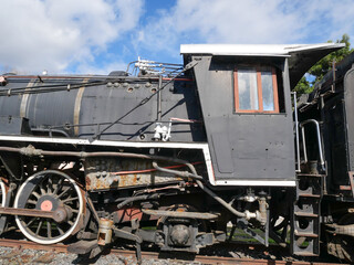 close-up view of cabin of an Old dilapidated steam locomotive