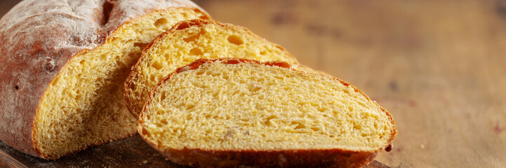 Fresh cornbread and corn grains on the table. Food grain crisis concept