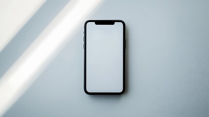 Smartphone turned off with screen facing up, black body, centered on white background with strong top-down light, soft gradient shadow under edges. Created Using: studio product lighting,