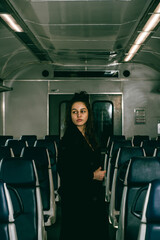 The girl is riding the train