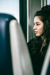 girl in the train by the window