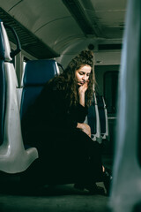 The girl is riding the train