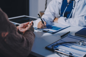 Specialized doctor is explaining taking medicine to a patient. Health and medicine consultation.