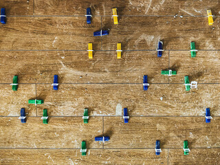 Plastic clips and wedges securing tiles in place for perfect alignment.  Tile leveling system with...