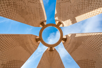 Aswan High Dam, Egypt: An upward view of the Soviet Friendship Monument in spring, showcasing its...