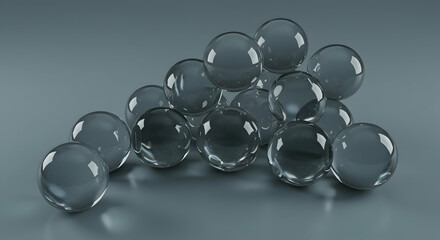 Fototapeta premium Transparent Glass Balls Piled on Smooth Gray Surface