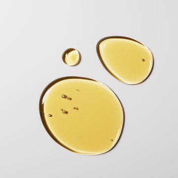 Drops of marula oil, skin care hydration concept of cosmetic product, 3d rendering