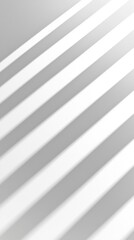 Obraz premium Bright light streams through slatted blinds, casting sharp shadows onto a smooth surface, creating a striking geometric pattern. The atmosphere feels modern and clean