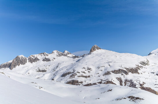 View of the Swiss Lepontine Alps near Sedrun during a ski tour to Piz Pazzola