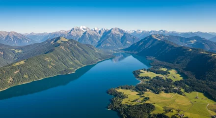 Gardinen Aerial View of Serene Alpine Lake and Mountains © DanadyaksaDen