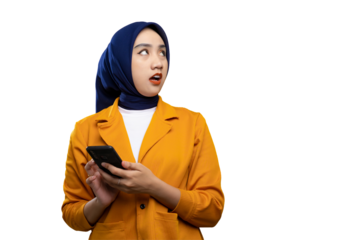 Surprised young Asian woman holding smartphone and looking aside at copy space, reacting to online offer isolated on transparent background