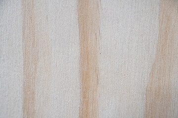 Close-up of light wood texture with subtle grain patterns.
