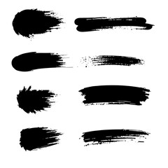 Paint brush strips with rough edges and fading marks on white background. Black smeared streaks with natural ink texture and vertical movement. Grunge elements