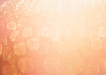 Orange bokeh sun glow abstract background