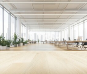 Modern open-plan office space with city views, light-colored wooden floor and furniture, blurred background