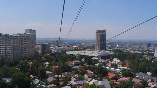 Scenic view from the funicular climbing toward the Kok Tobe observation deck in Almaty, Kazakhstan