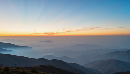 Fototapeta premium Serene mountain landscape at sunrise with misty valleys 