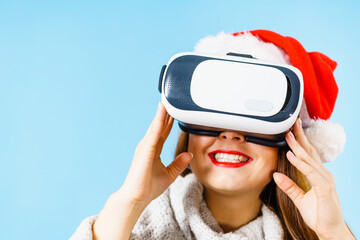 Girl watching 3d film tour in virtual reality glasses.