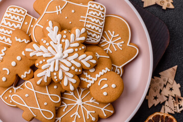 Christmas winter gingerbread, holiday biscuits on monochrome background