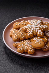 Christmas winter gingerbread, holiday biscuits on monochrome background