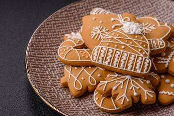 Christmas winter gingerbread, holiday biscuits on monochrome background