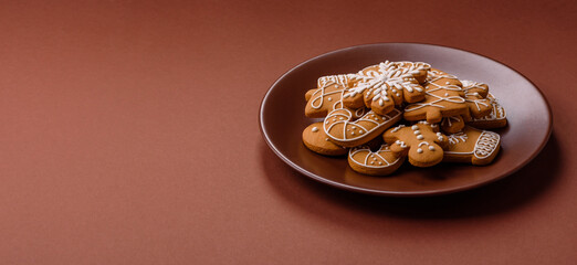 Christmas winter gingerbread, holiday biscuits on monochrome background
