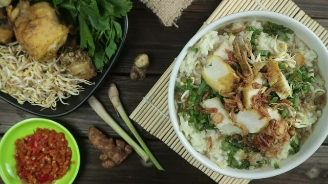 A bowl of soto ayam, a traditional Indonesian soup. Healthy food