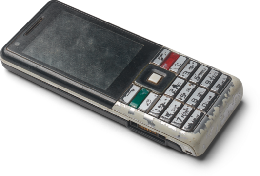 old obsolete mobile phone isolated white background, past generation handset cellphone with worn out physical keypad and scratched plastic - Powered by Adobe