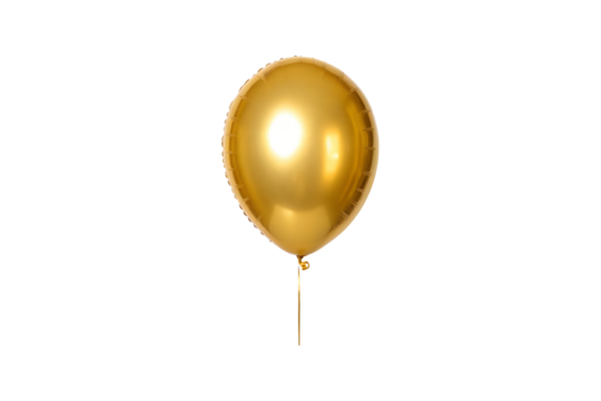Shiny golden balloon floats in mid air against a muted gray background