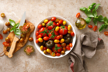 Fresh ripe cherry tomatoes and large red tomatoes, top view
