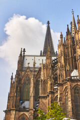 Cologne Cathedral - Gothic Architecture with Detailed Spires Against a Clear Blue Sky