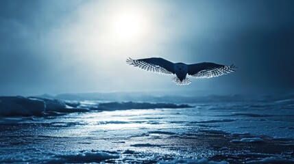 A silhouette of a snowy owl mid-flight over a desolate frozen tundra