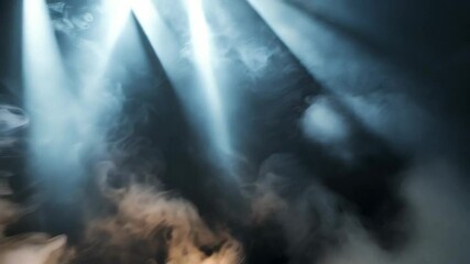 Dramatic stage scene with rising fog illuminated by bright spotlights creating an ethereal atmosphere and moody ambiance effect