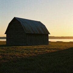 Obraz premium Solitary Barn Facing Quiet Water