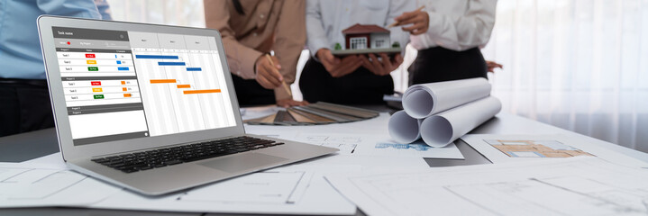 Project planning software for brisk business project management on the computer screen showing...