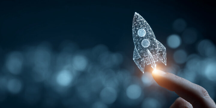 Wireframe rocket on fingertip against blurred dark background, symbolizing innovation, launch, and digital transformation Free space for text