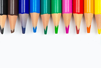 An Artistic and Colorful Collection of Drawing Pencils Arranged on a White Background