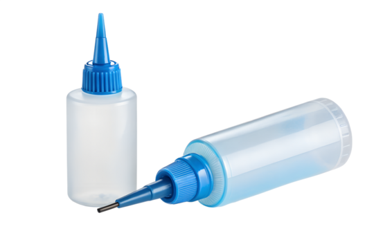 Two plastic squeeze bottles with precision tips on a black background medical laboratory