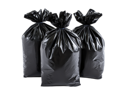 Set Of Three Black Plastic Garbage Bags Piled Together For Waste Disposal In A Clean And Organized Space