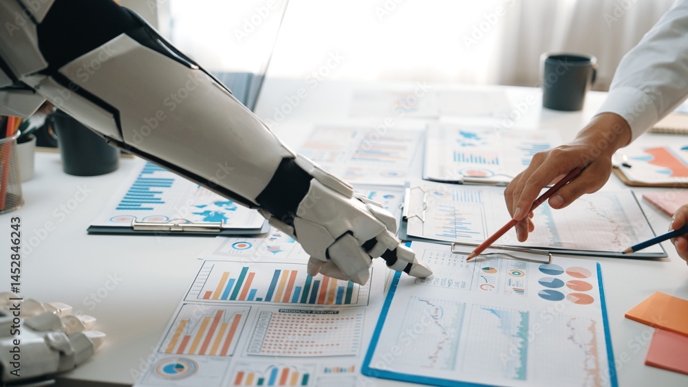 Poster a captivating image depicting a human hand and a robotic arm collaborating on data analysis in a mod
