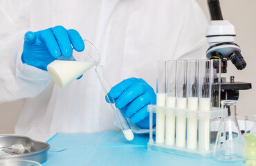 Examine milk in the laboratory. Selective focus.