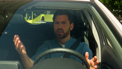 Angry dissatisfied man Caucasian man guy businessman male driver shout roadway traffic jam problem...