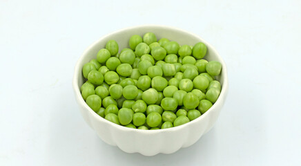 Green peas (Pisum sativum) are a globally popular legume, enjoyed daily in diverse cuisines, from fresh salads to cooked dishes worldwide.