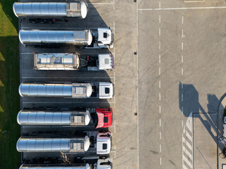 Fleet of trucks with tank trailers.