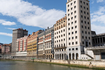 Fototapeta premium Residential buildings next to the Nervión River in Bilbao. Basque Country