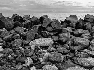 Detail of the imposing rocks for the artificial reef deposited to prevent coastal erosion of the...