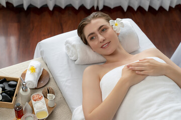 Caucasian woman customer enjoying relaxing anti-stress spa massage and pampering with beauty skin...