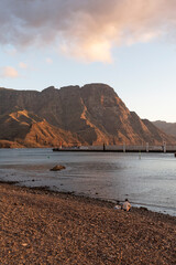 Sunset on Agaete beach. Gran Caria, Canary Islands. Vertical Photography