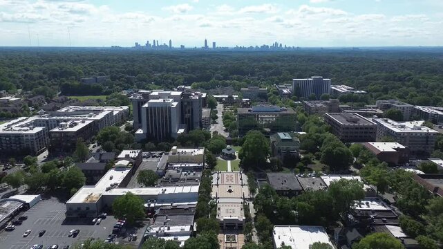 Reverse shot of the Atlanta skyline in the distance 